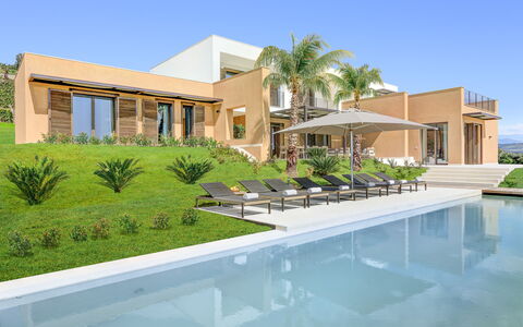Villa Corallo - Sea Front | By Rocco Forte Villas: Building, Plant, Water, Sky, Azure, Window, Tree, Swimming Pool, Residential Area, Arecales