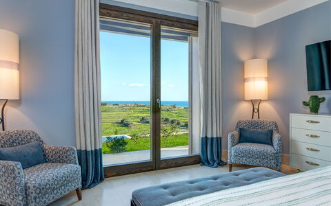 Villa Corallo - Sea Front | By Rocco Forte Villas: Building, Plant, Furniture, Window, Blue, Comfort, Azure, Shade, Cabinetry, Interior Design