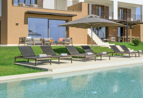 Villa Topazio - Sea View | By Rocco Forte Villas: Water, Window, Plant, Building, Shade, Swimming Pool, Outdoor Furniture, Sunlounger, Urban Design, Condominium