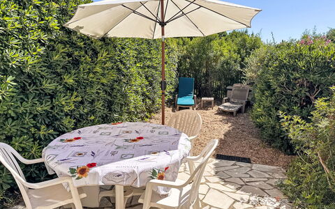 Le Plein Soleil: Furniture, Outdoor Furniture, Umbrella, Chair, Garden, Outdoor Table, Shade, Landscaping, Backyard, Yard