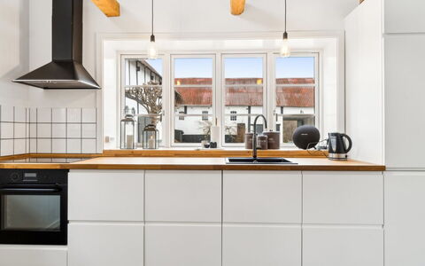 Sjard - 300M from the Sea: Kitchen, Kitchen Appliance, Countertop, Flooring, Cabinetry, Interior Design, Major Appliance, Wood, Kitchen Stove, Floor
