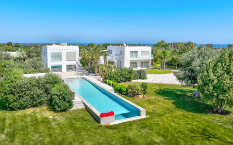 Villa Vinner: Sky, Plant, Property, Azure, Building, Tree, Urban Design, Grass, Residential Area, Real Estate