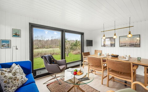 Jule - 1.3Km to the Fjord: Ceiling, Interior Design, Chair, Picture Frame, Hardwood, Living Room, Kitchen & Dining Room Table, Light Fixture, Wood Stain, Dining Room