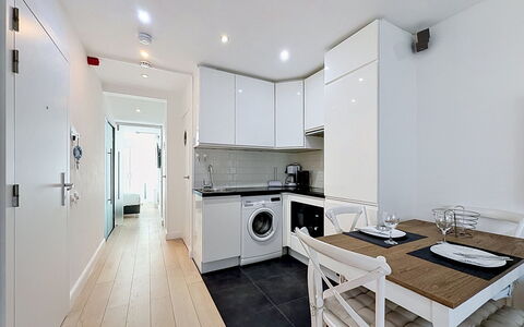 Centrally Located Key Point: Flooring, Interior Design, Floor, Major Appliance, Ceiling, Furniture, Kitchen, Kitchen Appliance, Room, Home Appliance