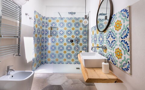 Alma Suite: Property, Plumbing Fixture, Purple, Shower Curtain, Bathroom, Blue, Building, Bathtub, Textile, Interior Design
