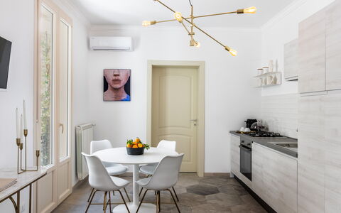 Alma Suite: Picture Frame, Furniture, Property, Table, Cabinetry, Building, Wood, Chair, Lighting, Architecture