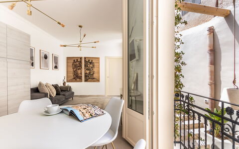 Alma Suite: Furniture, Property, Table, Chair, Building, Lighting, Plant, Interior Design, Picture Frame, Comfort