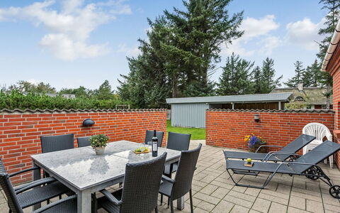 Pernilla - 2Km from the Sea: Furniture, Outdoor Furniture, Shrub, Chair, Outdoor Table, Garden, Brick, Landscaping, Patio, Backyard