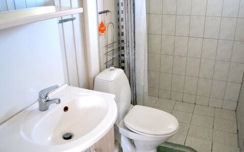 Kastehelmi - 400M from the Sea: Bathroom Sink, Bathroom, Toilet Seat, Plumbing Fixture, Sink, Toilet, Floor, Tap, Flooring, Plumbing