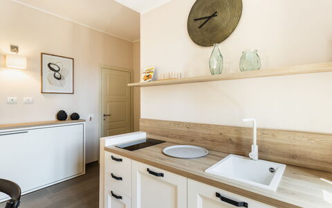 Donna Rosa Holiday Home: Sink, Cabinetry, Property, White, Wood, Tap, Interior Design, Lighting, Architecture, Floor