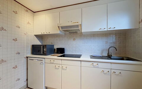 Edelweiss with Parking: Kitchen, Kitchen Appliance, Countertop, Major Appliance, Plumbing Fixture, Kitchen Sink, Sink, Flooring, Cabinetry, Tap
