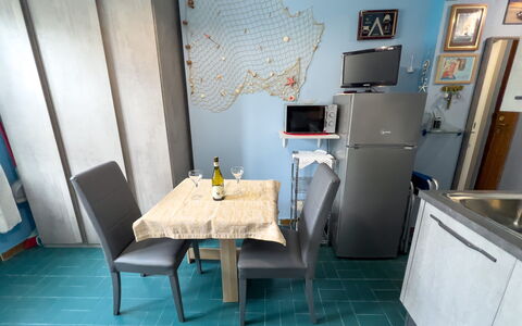 Casa Carlotta - San Bartolomeo Al Mare: Furniture, Table, Azure, Building, Chair, Floor, Sink, Cabinetry, Flooring, Desk
