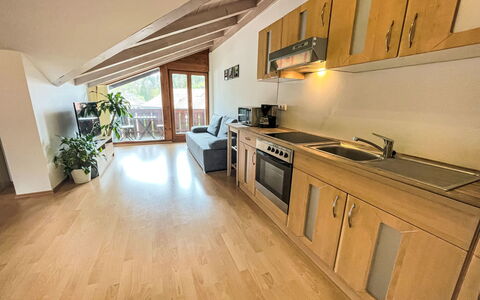 Blue Mountain Sky: Brown, Cabinetry, Countertop, Wood, Kitchen Stove, Plant, Flooring, Interior Design, Floor, Kitchen