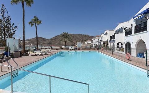 Los Canarios 122: Water, Sky, Swimming Pool, Azure, Shade, Outdoor Furniture, Tree, Leisure, Real Estate, Composite Material