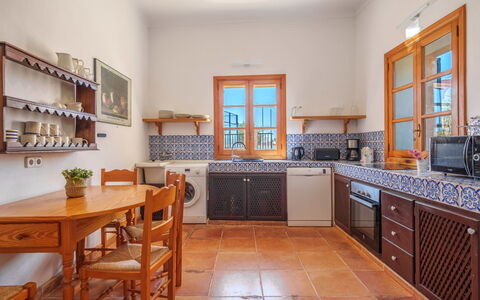 Gran Llombards: Furniture, Cabinetry, Countertop, Wood, Kitchen, Interior Design, Table, Flooring, Floor, Sink