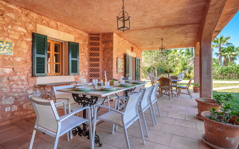 Gran Llombards: Table, Furniture, Plant, Property, Building, Chair, Flowerpot, Window, Wood, Interior Design