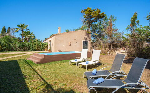 Gran Llombards: Plant, Sky, Plant Community, Natural Landscape, Shade, Outdoor Furniture, Tree, Land Lot, Grass, Cottage