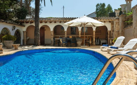 Les Oliveres: Water, Property, Plant, Azure, Swimming Pool, Sky, Shade, Body Of Water, Tree, Umbrella