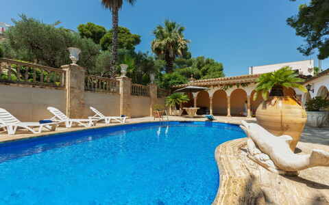 Les Oliveres: Water, Plant, Property, Sky, Furniture, Building, Swimming Pool, Azure, Tree, Chair