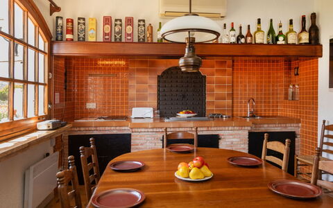 Les Oliveres: Table, Cabinetry, Countertop, Property, Furniture, Kitchen, Window, Chair, Wood, Lighting