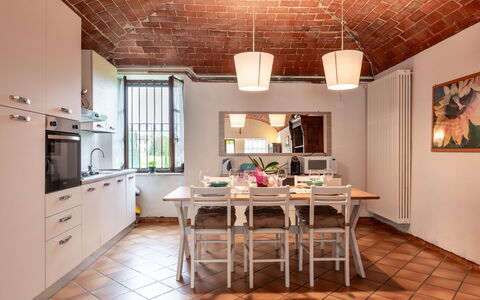 Castell' Alfero 100: Furniture, Property, Cabinetry, Table, Countertop, Wood, Kitchen, Kitchen Appliance, Lighting, Interior Design