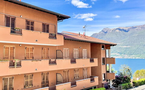 La Casa del Musicista: Building, Cloud, Sky, Window, Plant, Tree, House, Urban Design, Mountain, Residential Area