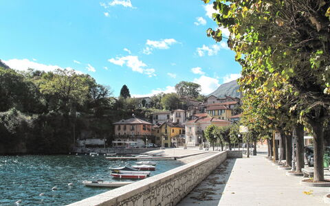 Trekking House: Water, Cloud, Sky, Building, Boat, Watercraft, Plant, House, Architecture, Arecales