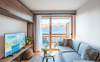 Swisspeak Resorts Thyon 4 Vallées 9000.8: Interior Design, Wood, Room, Furniture, Ceiling, Apartment, Living Room, Hardwood, Mountain Range, Wood Stain