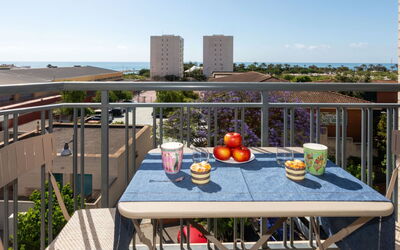 Vinarós 620: Sky, Table, Property, Furniture, Building, Plant, Chair, Window, Outdoor Table, Tableware