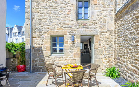 Colary: Building, Plant, Furniture, Property, Window, Table, Flowerpot, Chair, Blue, Outdoor Table