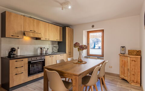 Miki Mhouse: Cabinetry, Property, Furniture, Countertop, Wood, Table, Interior Design, Lighting, Floor, Flooring
