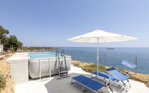 Norbert: Water, Sky, Property, Plant, Umbrella, Shade, Outdoor Furniture, Sunlounger, Tree, Coastal And Oceanic Landforms