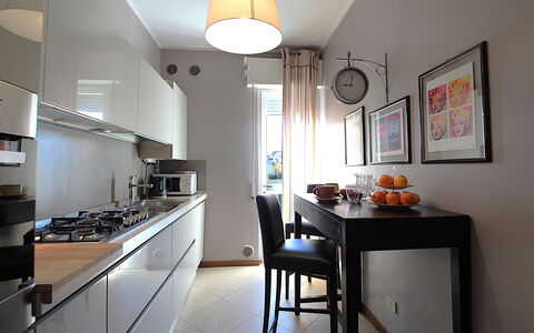 Provenzale Apartment, Garda Lake, Jacuzzi, Fitness: Furniture, Table, Cabinetry, Countertop, Lighting, Interior Design, Kitchen Appliance, Kitchen Stove, Chair, Kitchen