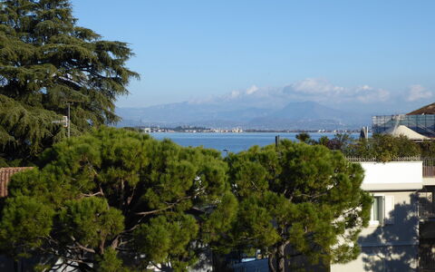 Catullo 18 Apartment, Garda Lake, Jacuzzi, Fitness: Sky, Water, Cloud, Mountain, Lake, Tree, Landscape, Horizon, City, Hill Station