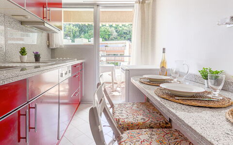 L'Antonia: Cabinetry, Property, Furniture, Table, Countertop, Kitchen, Interior Design, Wood, Tableware, Architecture