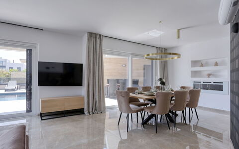 Villa Petra: Furniture, Property, Table, Building, Wood, Chair, Interior Design, Shade, Flooring, Living Room