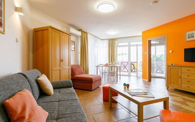 Balatonlelle 101: Furniture, Table, Cabinetry, Wood, Orange, Interior Design, Comfort, Flooring, Floor, Building