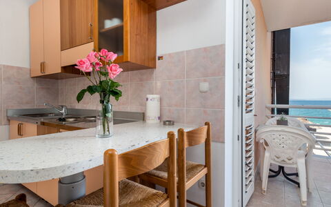 Podstrana 111: Flower, Table, Furniture, Chair, Plant, Wood, Building, Interior Design, Architecture, Water