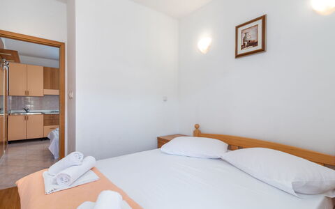 Podstrana 111: Furniture, Property, Comfort, Bed, Building, Wood, Bedroom, Hardwood, Shelf