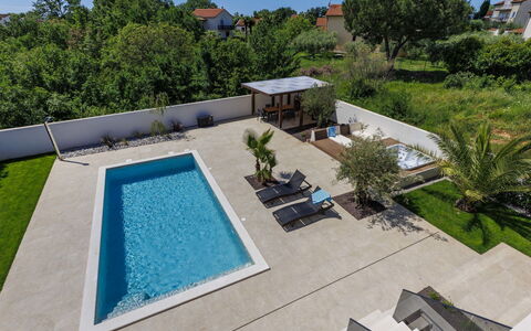 Villa Sandro: Plant, Property, Sky, Water, Tree, Building, Swimming Pool, Urban Design, Condominium, Residential Area