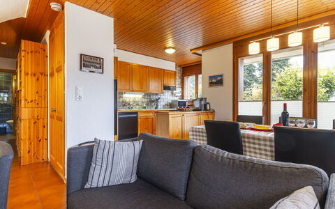 Pavillons a: Furniture, Property, Couch, Lighting, Interior Design, Wood, Living Room, Floor, Comfort, Flooring