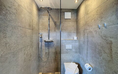 Skyline Retreat: Wall, Flooring, Plumbing Fixture, Floor, Shower Head, Bathroom, Plumbing, Ceiling, Shower, Tile