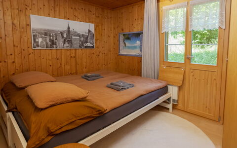 Chalet Anita: Bedroom, Wood, Interior Design, Bed, Floor, Flooring, Furniture, Bed Sheet, Room, Bedding