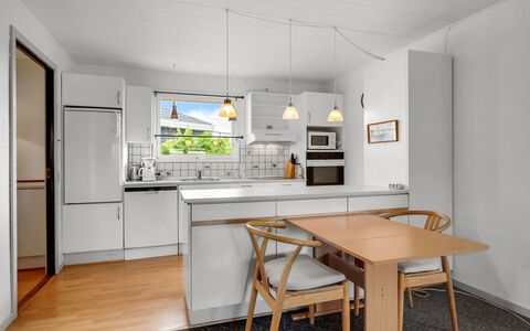 Mads - 400M from the Sea: Furniture, Kitchen, Interior Design, Flooring, Countertop, Kitchen Appliance, Floor, Wood, Ceiling, Kitchen & Dining Room Table
