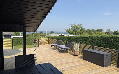 Ofrath - 350M to the Fjord: Wood, Deck, Hardwood, Shade, Plank, Outdoor Furniture, Wood Stain, Wood Flooring, Porch, Backyard