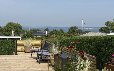 Ofrath - 350M to the Fjord: Shrub, Flowerpot, Outdoor Furniture, Shade, Garden, Deck, Eco Hotel, Landscaping, Chair