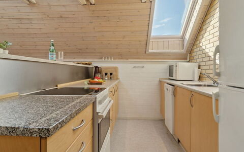 Jolanta - 20M from the Sea: Kitchen, Countertop, Wood, Flooring, Major Appliance, Kitchen Appliance, Cabinetry, Interior Design, Floor, Ceiling