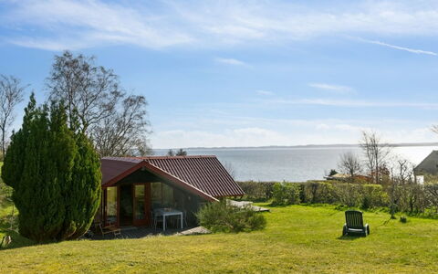 Asel - 25M from the Sea: Roof, Home, Door, Cottage, Shade, Siding, Yard, Estate, Backyard