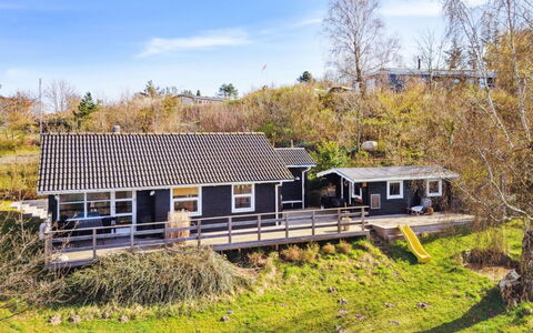 Usbjorn - 500M from the Sea: Cottage, Home, Porch, Siding, Farmhouse, Log Cabin, Fence, Backyard
