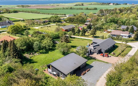 Melina - 900M to the Fjord: Blue, Shrub, Cottage, Groundcover, Garden, Estate, Shade, Landscaping, Farmhouse, Eco Hotel